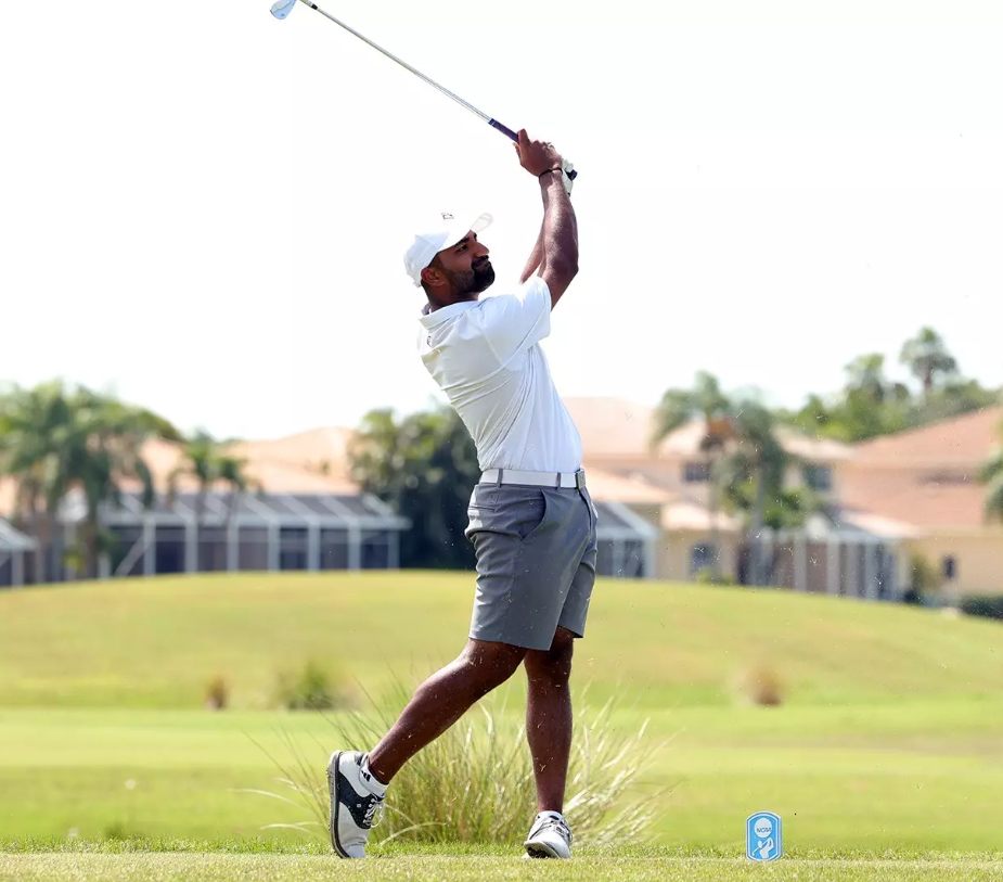 Yadhu Urs following through on a swing, Florida course