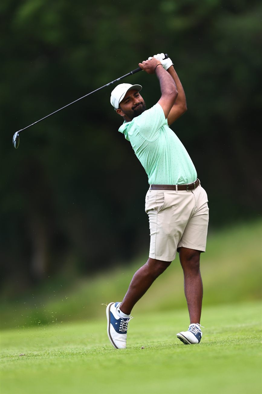 Yadhu Urs following through on a driver swing