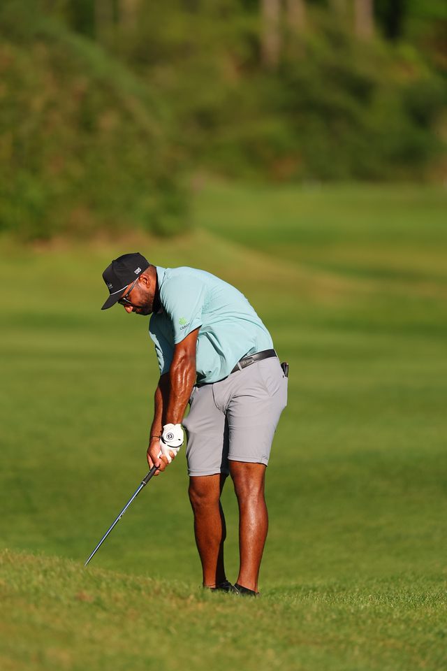 Yadhu Urs playing an approach shot