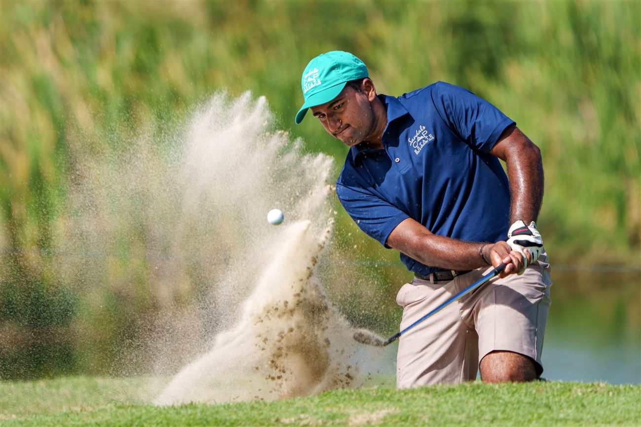 Yadhu Urs blasting from a greenside bunker at the 2023 LAAC